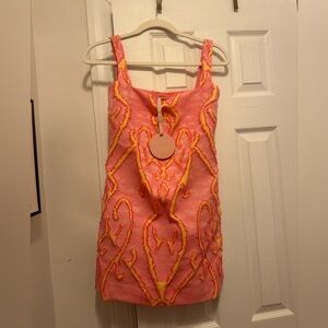 Brand new with tags Alexis mini dress!! Size XS!!